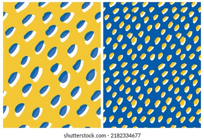 Abstract Hand Drawn Grunge Vector Pattern Set. Freehand Brush Spots on a Dark Blue and Yellow Background. Modern Irregular Geometric Seamless Pattern ideal for Fabric, Textile. Cool Repeatable Print.