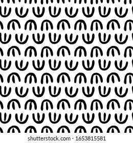Abstract hand drawn seamless pattern. Ink mark. Abstract shapes. Black on white. Simple texture. Sketchy style. For fabrics, wrapping paper, wallpaper
