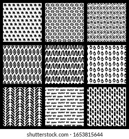 Abstract hand drawn seamless pattern set. 9 patterns. Ink mark. Abstract shapes. Black on white. Simple texture. Sketchy style. For fabrics, wrapping paper, wallpaper