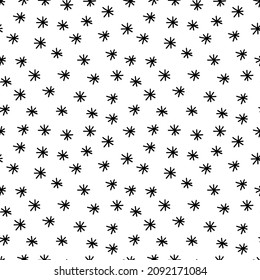 Abstract hand drawn seamless pattern with snowflake shape elements. Black and white texture. Doodle style vector.