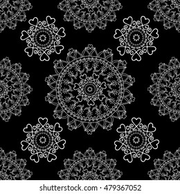 Abstract hand drawn seamless pattern with mandala.