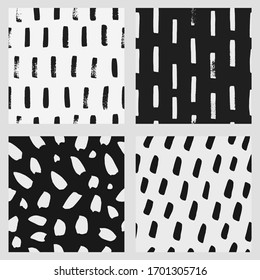Abstract hand drawn vector seamless pattern set. Black and white brush strokes background, monochrome repeat pattern	