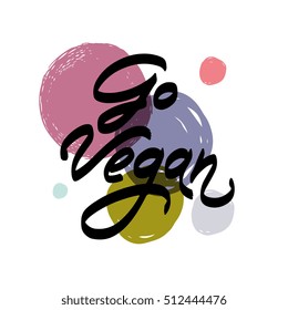 Abstract hand painted textured ink brush background with isolated poster "Go Vegan"