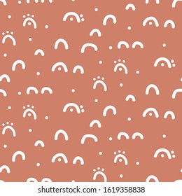 Abstract hand sketched small shapes modern seamless pattern in terracotta tan colors. Repeat texture hand-drawn design dash vector background.