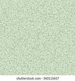 Abstract hand-drawn leafy doodle seamless pattern in pastel greenish vintage colors.