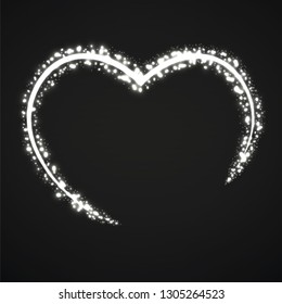 Abstract heart of glowing particles. Sparkling heart. Valentine's Day symbol. Vector