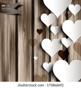 Abstract heart on wooden background