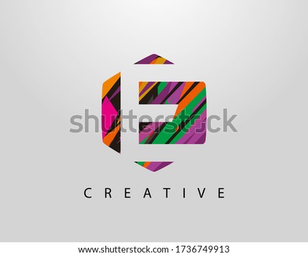 Abstract Hexagon E Letter Logo. Initial E With Creative Colorful Strips 