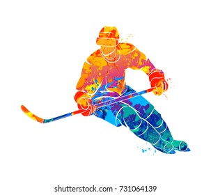 Abstract hockey player from a splash of watercolors. Winter sport. Vector illustration of paints.