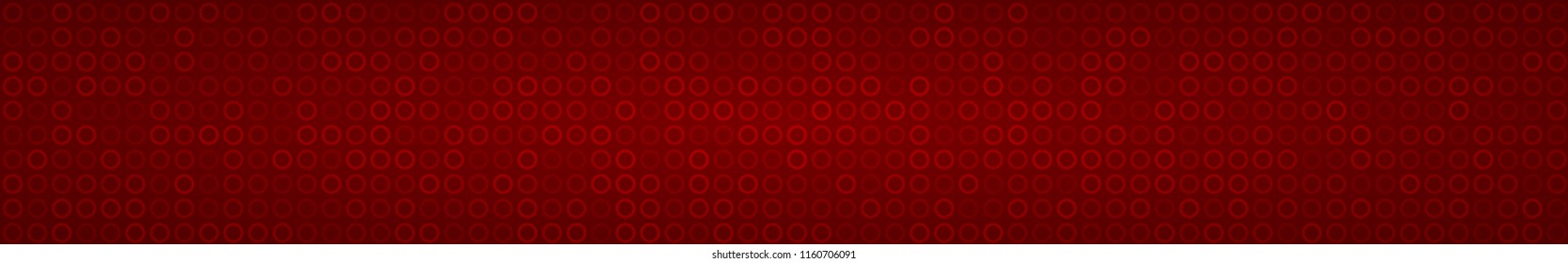 Abstract horizontal banner or background of small rings in red colors.