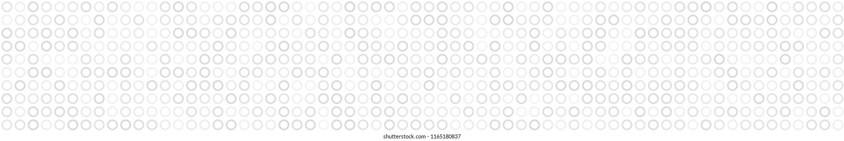 Abstract horizontal banner or background of small rings in white colors.