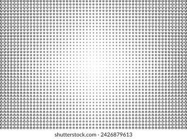 Abstract horizontal halftone effect background with blur towards the center. Black rings, bubbles on a transparent background, optical illusion, expansion of space