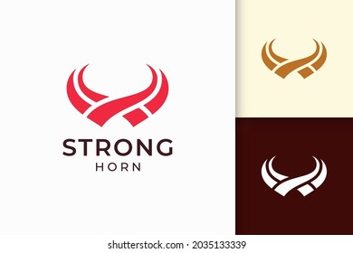 Abstract horn logo in solid red color