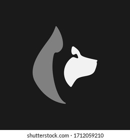 Abstract husky dog head side view portrait symbol on black backdrop. Design element