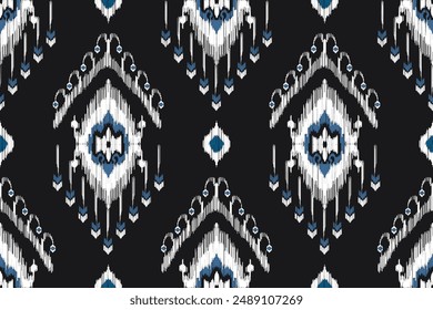 Abstractas patrón de ikat para arte étnico sin fisuras en estilo tribal y folclórico. Imprimir Adorno geométrico azteca. Diseño para tela, alfombra, Fondo de pantalla, ropa.