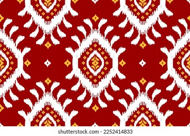 Abstract ikat red pattern art. Geometric ethnic ikat seamless pattern in tribal. American and Mexican style. Design for background, Vector illustration, fabric, clothing, carpet, batik, embroidery.