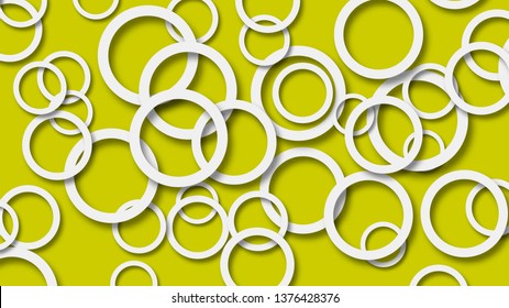 Abstract illustration of randomly arranged white rings with soft shadows on yellow background