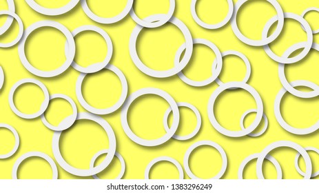 Abstract illustration of randomly arranged white rings with soft shadows on yellow background