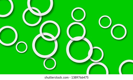 Abstract illustration of randomly arranged white rings with soft shadows on green background