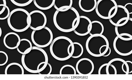 Abstract illustration of randomly arranged white rings with soft shadows on black background
