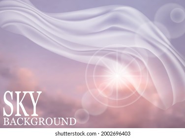 Abstract image. Fluttering fabric and shining light in the evening sky.