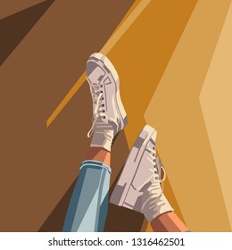 Abstract image of legs in sneakers. yellow brown background