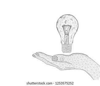 Abstract image light bulbs in hand in the form of lines, consisting of triangles and geometric shapes. Low poly vector background.