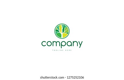 Abstract image of a tree silhouette made up of green fragments.