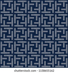 Abstract indigo shibori seamless vector pattern with white ikat print of mosaic