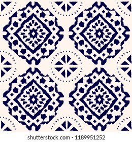 Abstract indigo shibori seamless vector pattern with ikat print of mosaic on white background