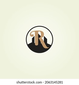 Abstract initial letter R logo in brown color with silhouette black city building in a form of a circle shape. This logo is suitable for property, real estate, mortgage, realty, construction company