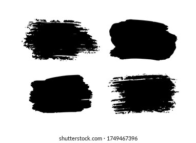 Abstract ink textures set. Black brushed stains isolated on white background. Handmade design elements.  Vector illustration.