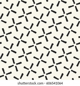 Abstract irregular cross elements textured background. Seamless pattern.