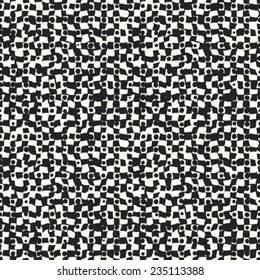 Abstract irregular dot and square noisy background in black and white. Seamless pattern. Vector.