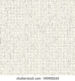 Abstract irregular dotted textured background. Seamless pattern.