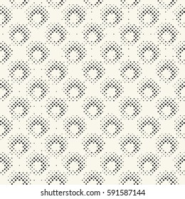 Abstract irregular halftone variegated dots. Seamless pattern.