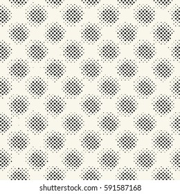 Abstract irregular halftone variegated dots. Seamless pattern.