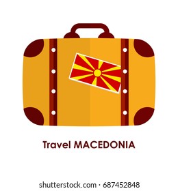 Abstract isolated vector illustration. Red and orange suitcase with Macedonia flag on it and words "Travel Macedonia" under it. Traveling and patriotism theme.