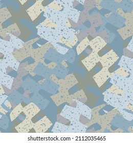 Abstract jigsaw puzzle vector seamless pattern. Neutral background with overlapping pieces and terrazzo texture.. Grunge textured backdrop. Rounded jagged comblike playful shapes repeat