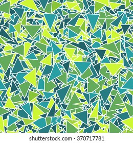 Abstract kaleidoscopic triangles seamless pattern. Random geometric texture. Blue, green, lime triangular objects with white border.