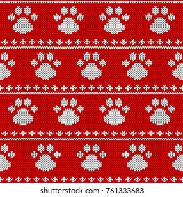 Abstract knitted dog paw seamless pattern background. Knit texture for design new year card, christmas invitation, holiday wrapping paper, winter vacation travel and ski resort advertising etc.