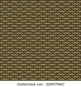 Abstract knitted fabric texture. Mottled sweater in brown and yellow.