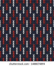 Abstract knitted pattern. Seamless winter knit texture in dark blue, bright red, and white for sweater, top, dress, socks, or other modern textile design.