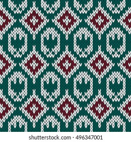 Abstract knitting ornamental seamless vector pattern with rhombus and stylized eagle as a knitted fabric texture in red, green and white colors