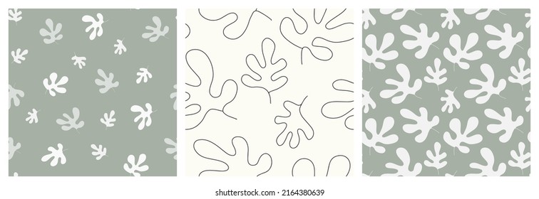 Abstract leaf organic shapes seamless pattern set in natural green and off-white colors. Vector background collection for summer dress fabric or kitchen textile.