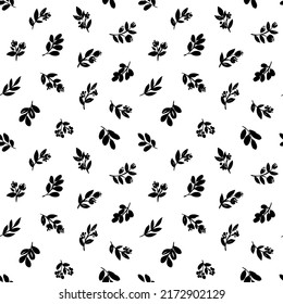 Abstract leaves and branches silhouettes seamless pattern. Hand drawn black brush painted branches. Vector foliage silhouettes. Natural organic ornament. Plants and flowers background 