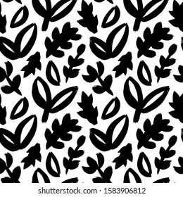 Abstract leaves and branches vector seamless pattern. Freehand brush leaves and twigs. Grunge hand drawn minimal plant twigs black and white texture. Botanical decorative background. Natural wallpaper
