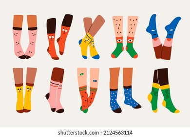 Abstract legs in socks. Hand drawn funny pairs of female male feet in trendy clothing items. Flat vector illustration