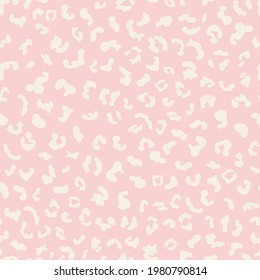 Abstract leo seamless repeat pattern. Random placed, ecru white vector animal all over surface print on pink background.