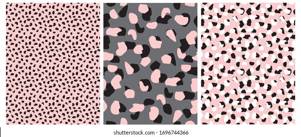 Abstract Leopard Skin Seamless Vector Patterns. White, Pink and Black Irregular Brush Spots on a Gray and Pink Backgrounds.  Abstract Wild Animal Skin Print. Simple Irregular Geometric Design.